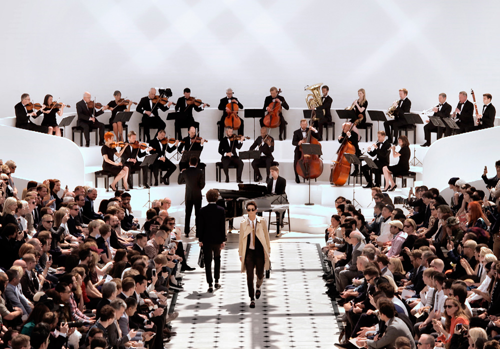 Live performance by British musician Rhodes, accompanied by a 24-piece orchestra conducted by Joe Duddell at the Burberry 'Strait-Laced' menswear Spring Summer 2016 show