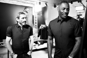 Idris Elba checks out the first sample of the Leading Man shirt with Superdry Co-Founder, Product and Brand Director, Julian Dunkerton